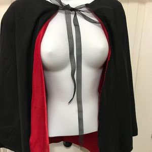 Reversible black/red cape